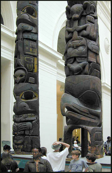 Detail of two Haidia Totem Poles on display in The Field Museum of Natural