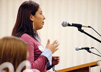 A Goshen College nursing student presents a topic at the convention
