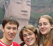 Daron, Sophie, and Liz in front of the Leshan Buddha