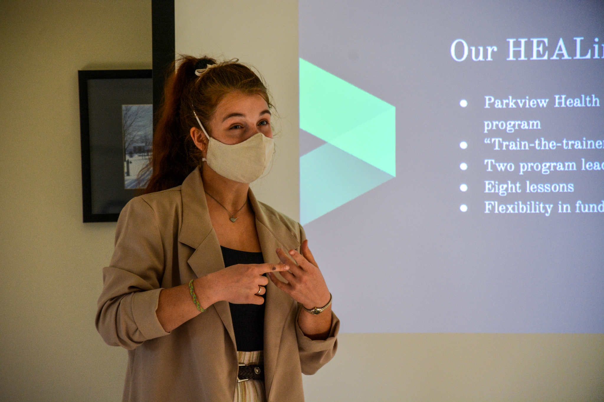 Emma gives a presentation about the cohort’s semester-long community development project.