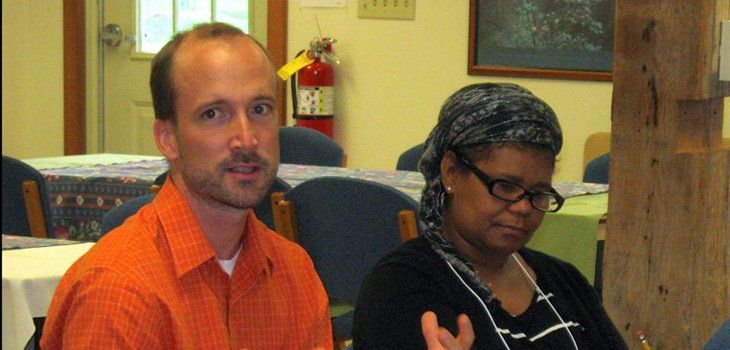 Jonathon Schramm, Director of Merry Lea’s Institute for Ecological Regeneration, describes an ecocentric perspective. Izaete Nafziger, a pastor at North Goshen Mennonite Church is also pictured.