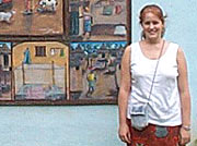 Andrea in front of wall mural