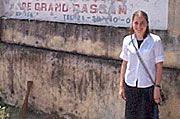 Stacie in front of wall