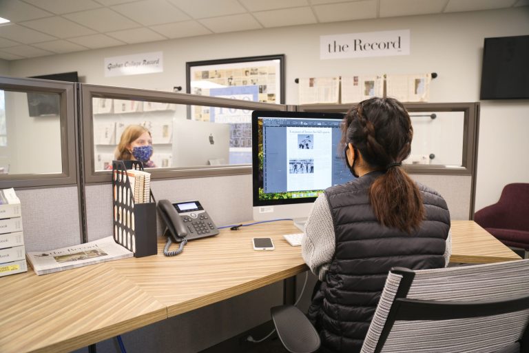 Student in the Communications newsroom