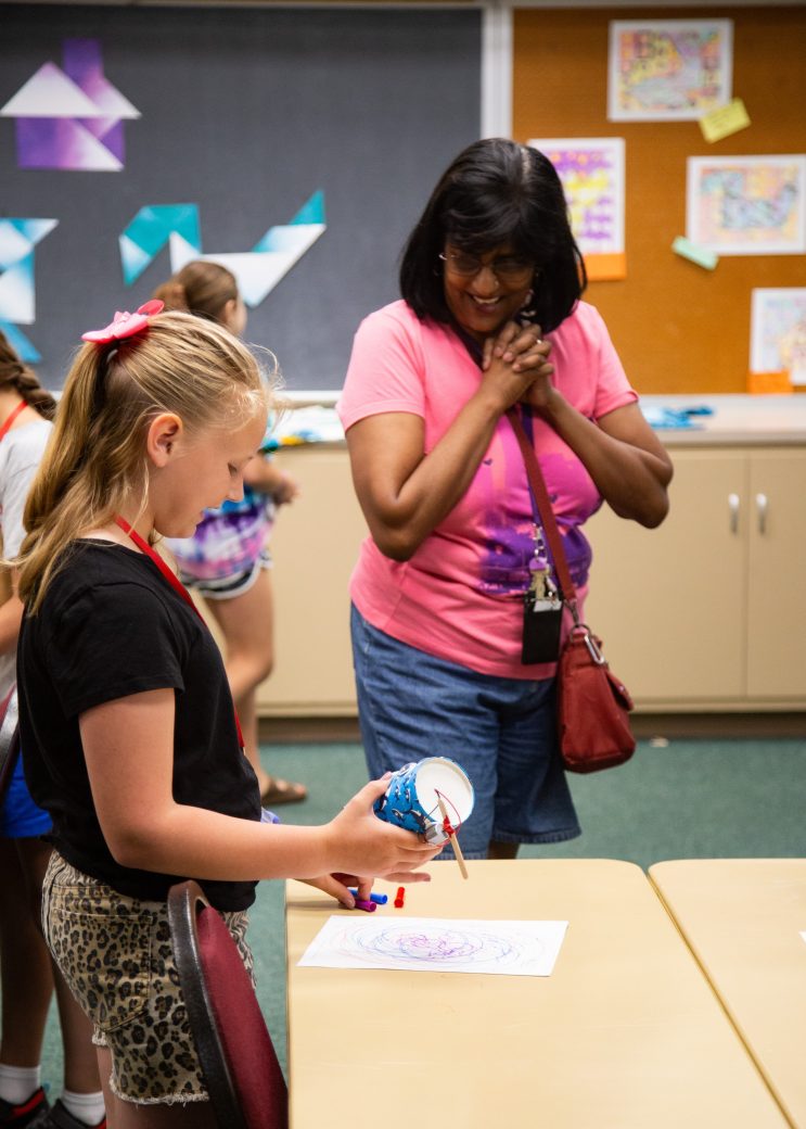 camper shows camp leader her work