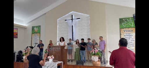 Students on a church alter