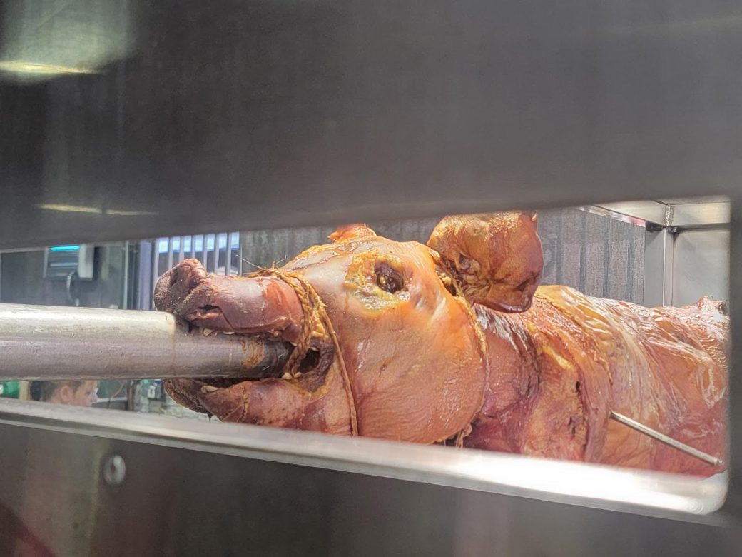 Pig roasting on a spit