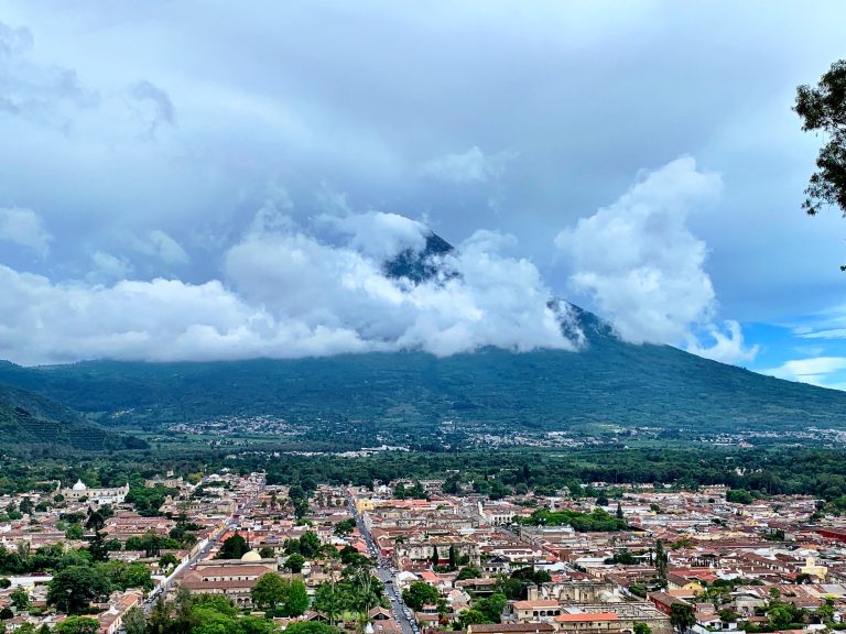 aerial view of city in Guatemala, houses and clouds