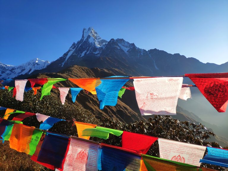Tibetan prayer flags in the Indian Himalayas, mountain in background