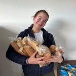 Getting ready to sort donated bread.
