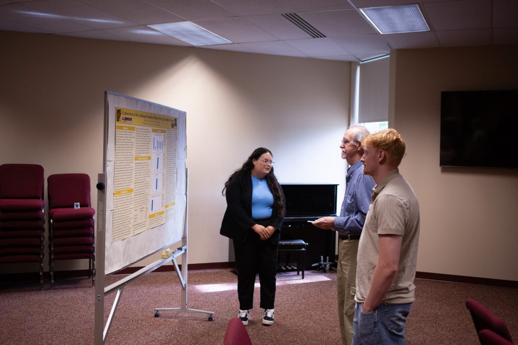 Garcia Coto presents a poster