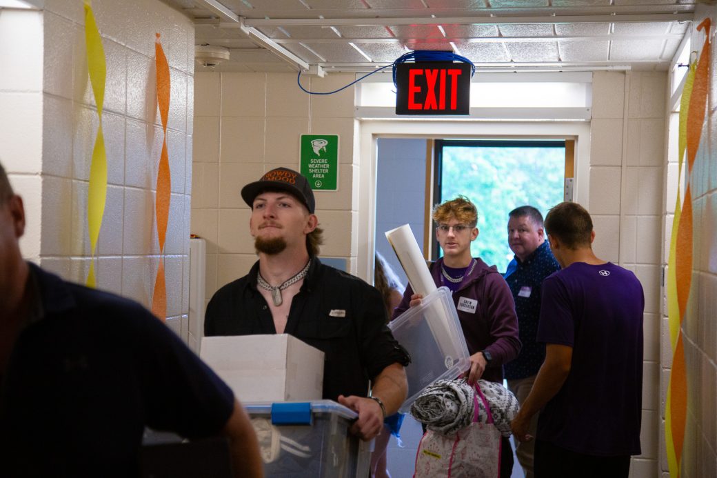 People carrying boxes