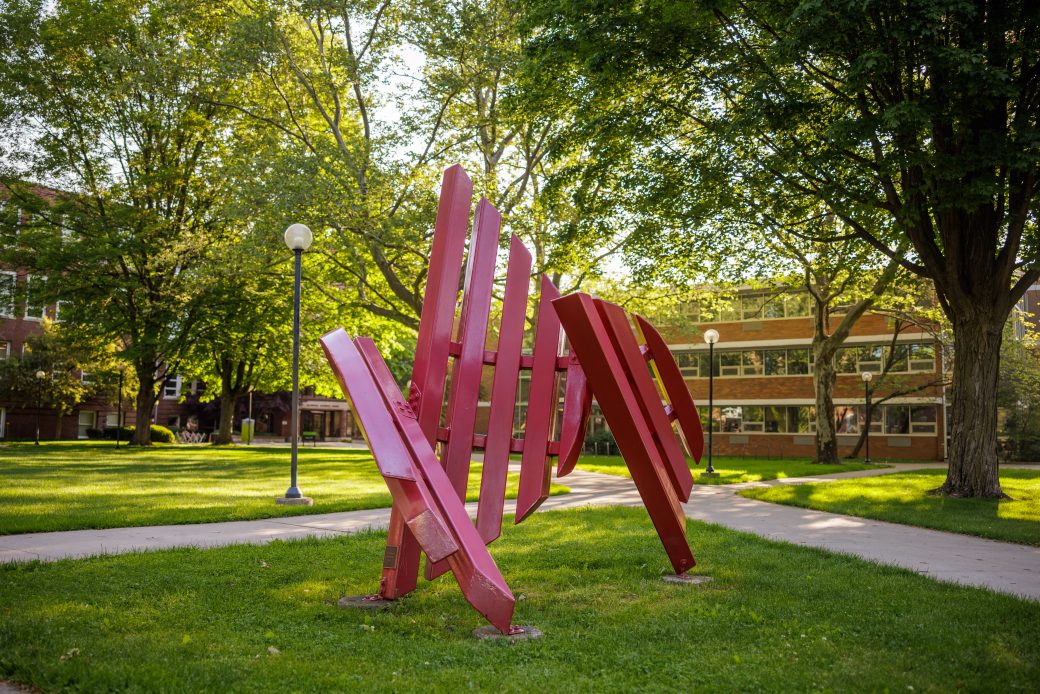 Broken Shield sculpture in the center of campus