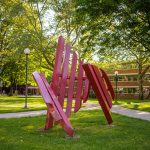 Broken Shield sculpture in the center of campus