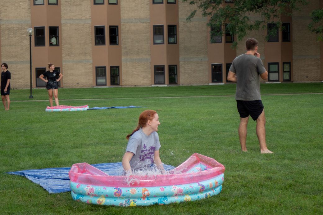 Students play slip-and-slide kickball