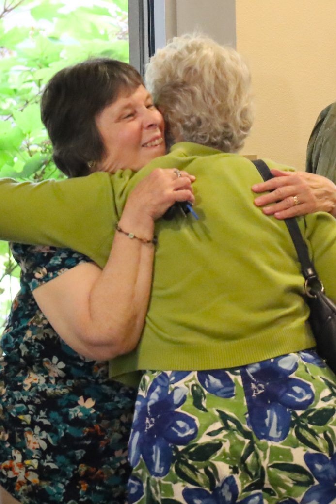 old friends hugging