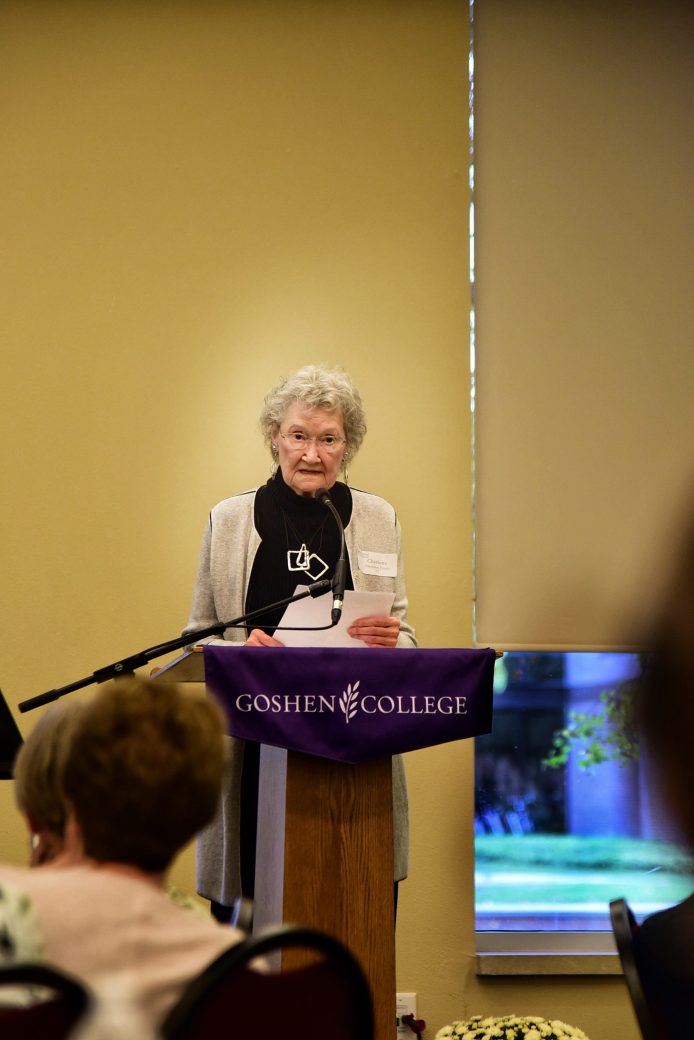 nursing alumna speaking at podium