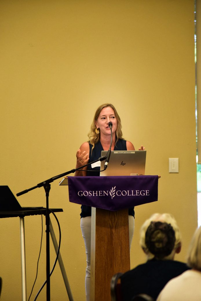 nursing alumni speaking at podium