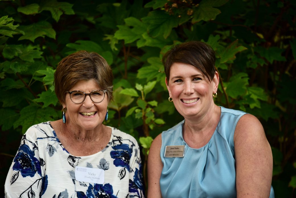 current nursing program director and former nursing director smile at camera