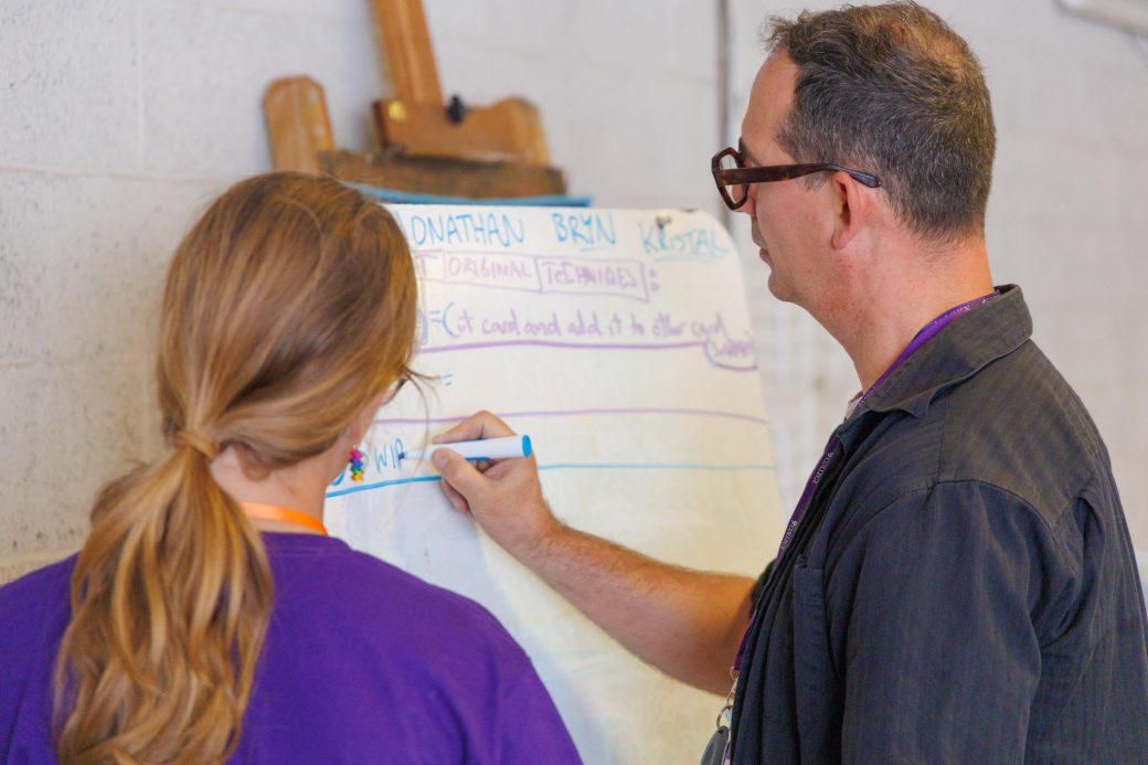 Teacher showing campers