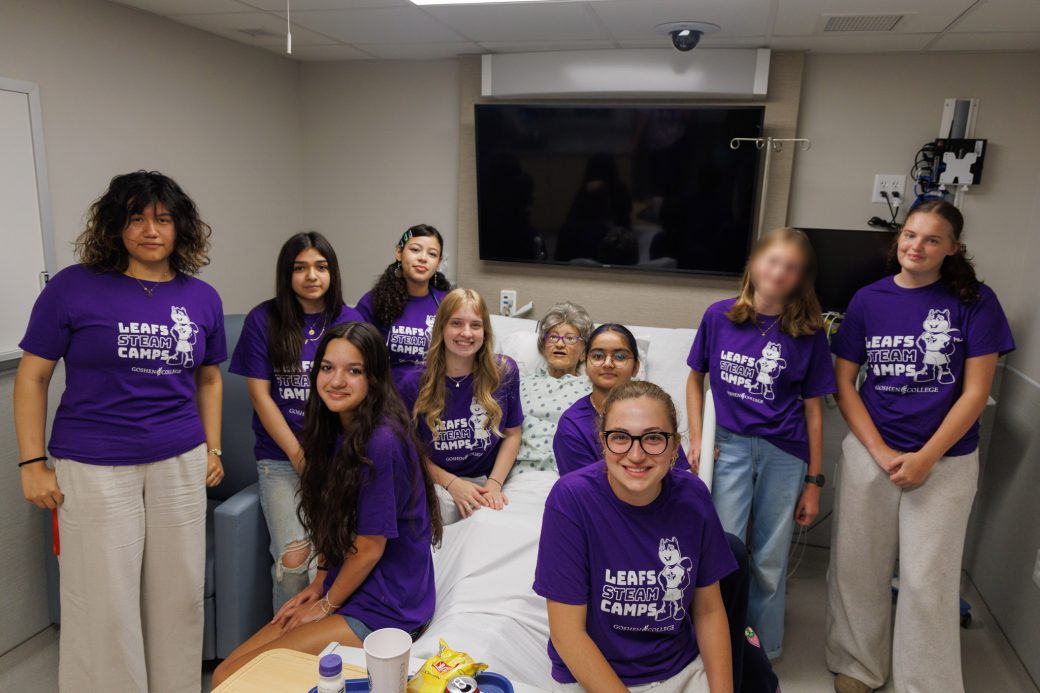 Nursing campers in lab with bed ridden mannequin
