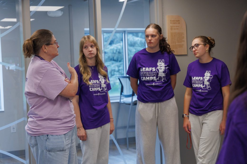 Nursing summer campers talking to teacher