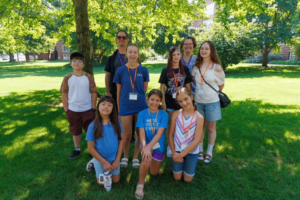 small group of campers smiling