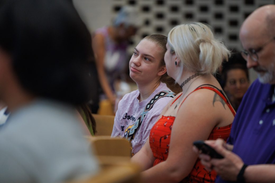 Two students chat in church-chapel
