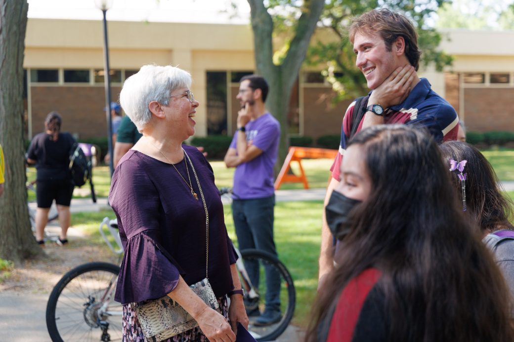 President Rebecca Stoltzfus talking to Ben Koop