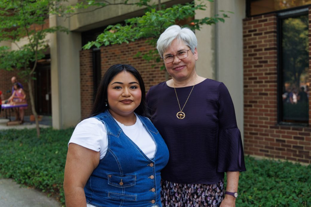 President Rebecca Stoltzfus standing beside student, Angelica Garcia-Ponce