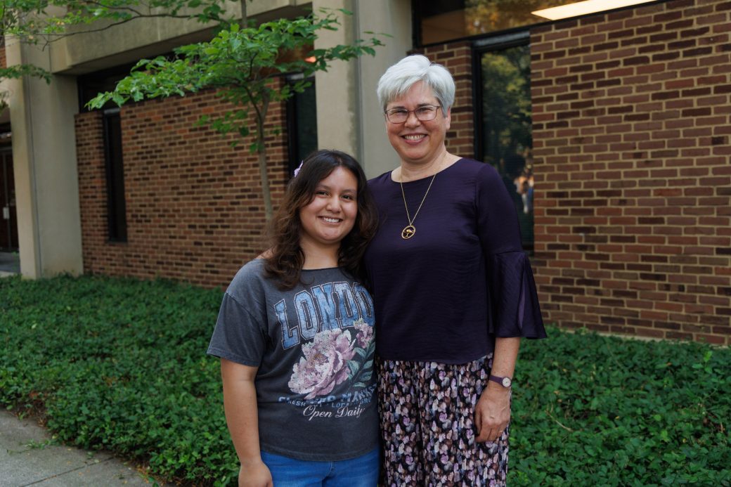 President Rebecca Stoltzfus standing beside student, Summer Cuatepotzao Perez