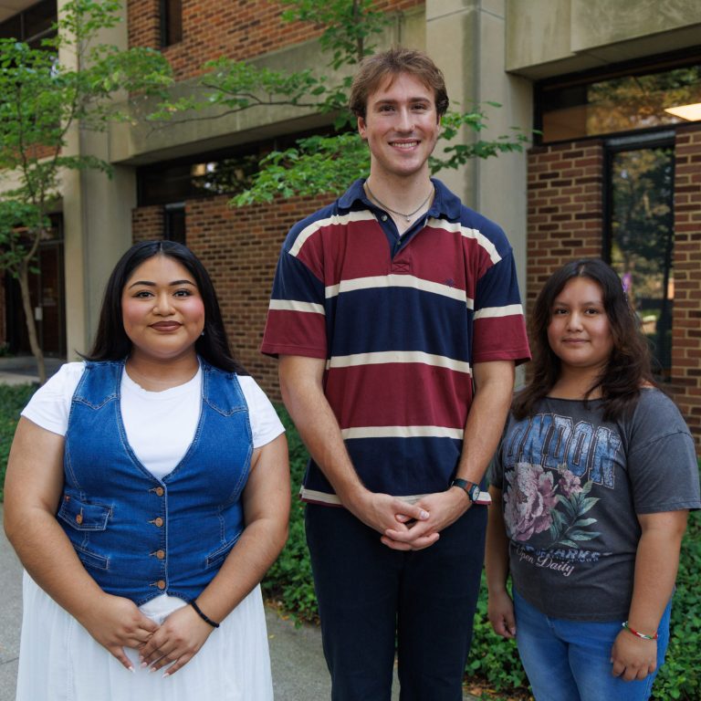 2026 Global Citizenship Award winners Ben Koop, Angelica Garcia-Ponce and Summer Cuatepotzo Perez outside of the Good Library.