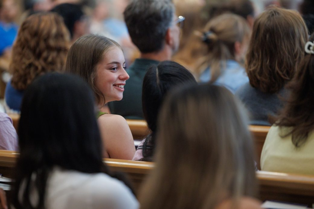 Caoimhe Farrell talking in church-chapel