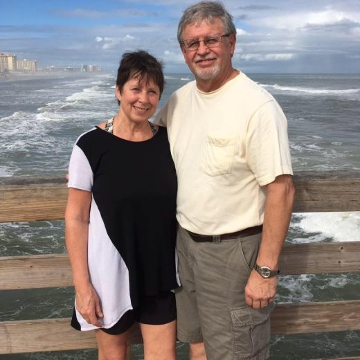 Bruce Kooker and his wife on the beach.