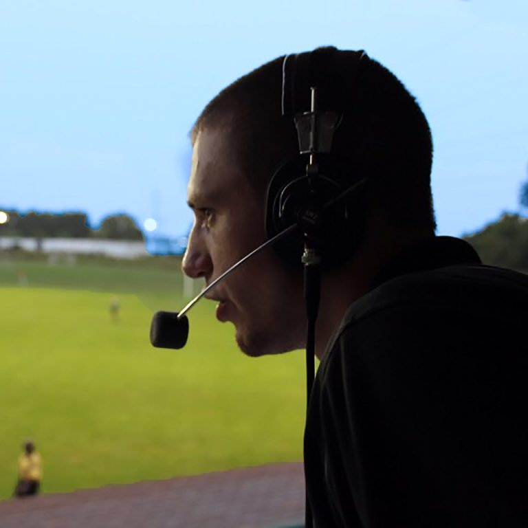 Dalton Shetler announcing at a Goshen College soccer game in 2016.