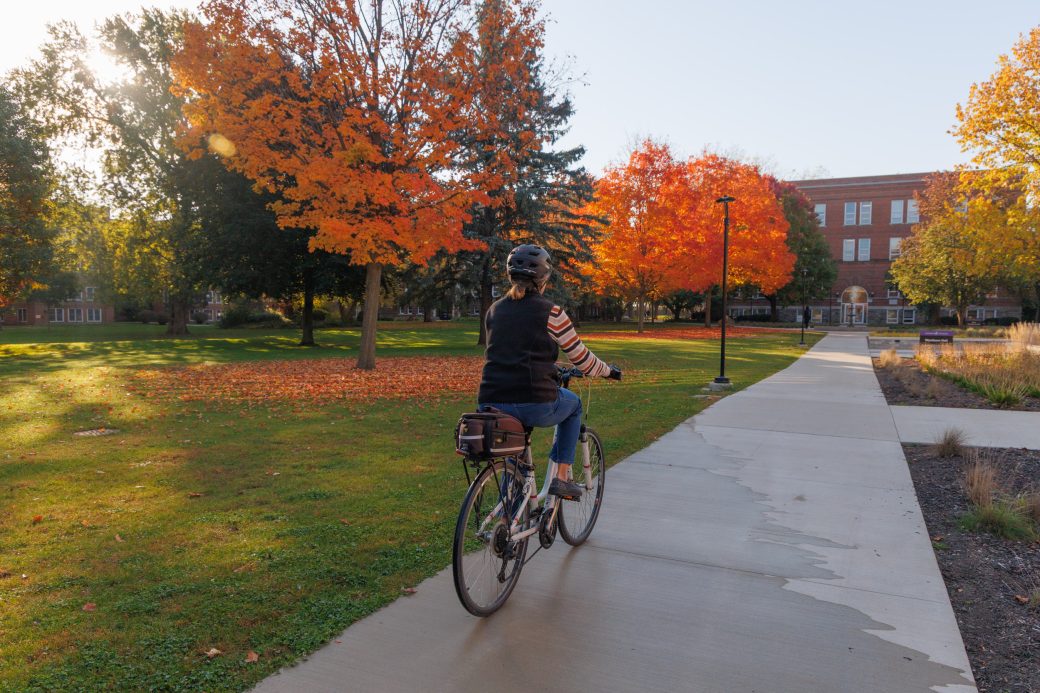 Bike rider and fall leaves