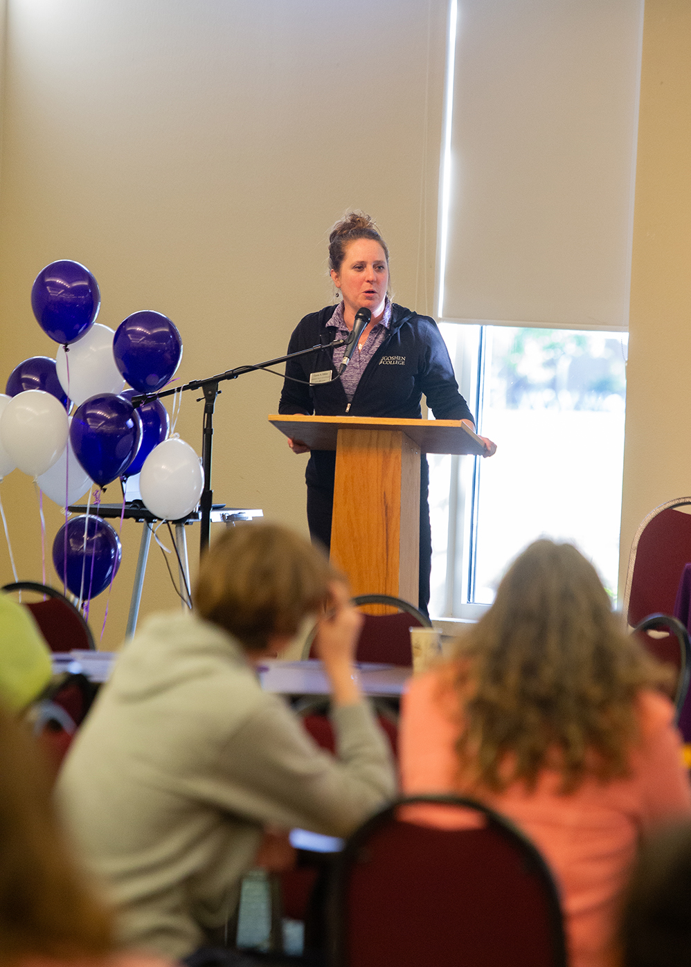 Carrie Eikler speaks with high school students for Nursing and Public Health Career Day