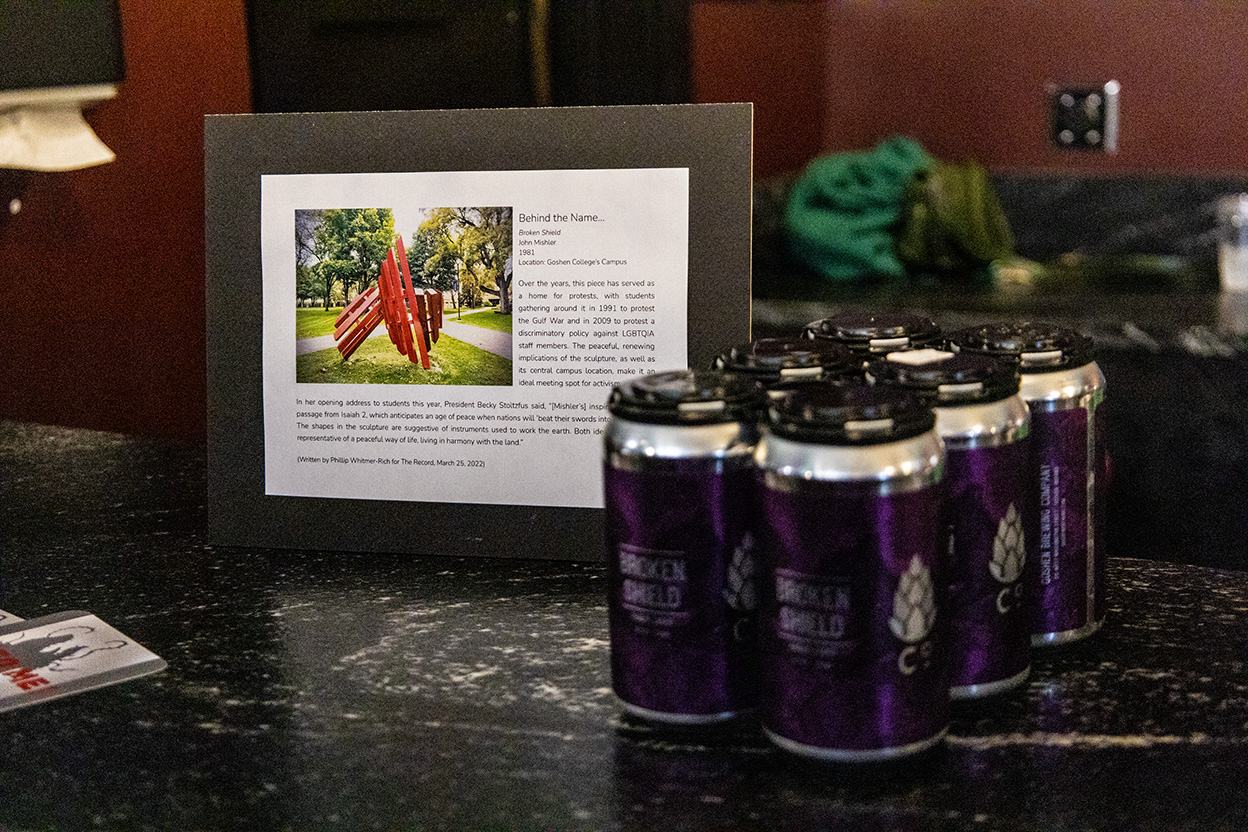 A poster shares the story behind the naming of Broken Shield beer from Goshen Brewing Company.