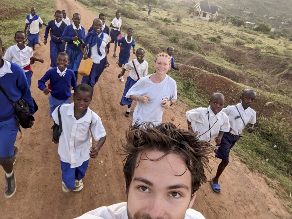 Trevor and Naomi and their running entourage in Musoma!