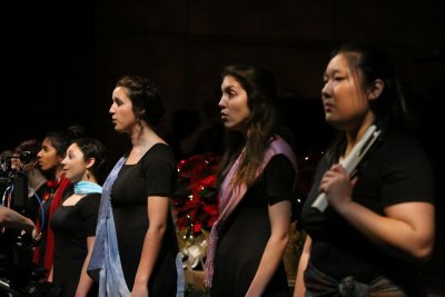 A line of women singing
