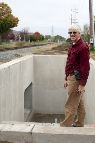 Oct. 2, 2012: Campus Utilities Manager and Project Coordinator Glenn Gilbert stands at the top of the west stairs to the underpass.