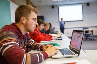 Goshen college students sitting in a small liberal arts class