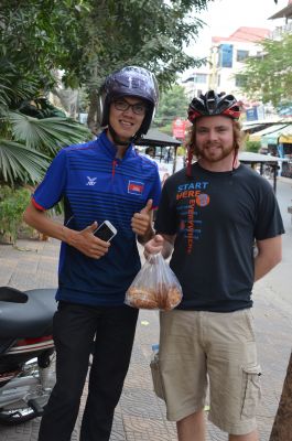 Andrew and his brother, Bong Veasna, making the waffle and pancake delivery.