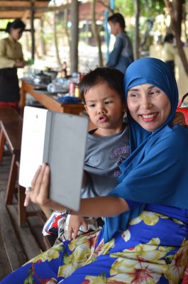 Maria takes a selfie with her son, Danish. Notice his GC t-shirt.