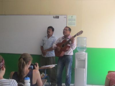 Humberto and Cesar sing the anthem of the crusade against illiteracy