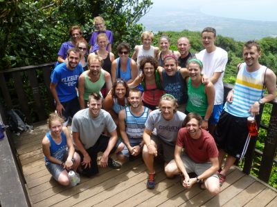 Almost all of the hikers celebrate at the end of the trail