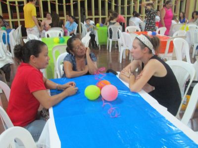 Emily relaxing with part of her host family.