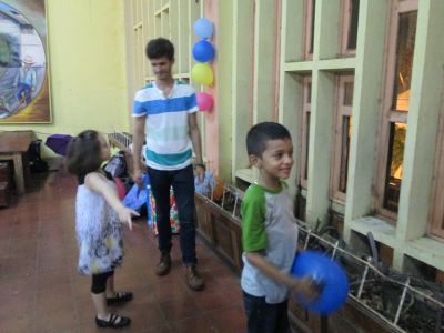 Luke having fun with the children.