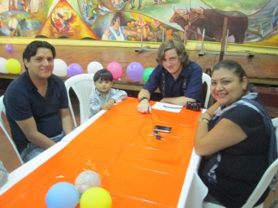 Aaron with his host family members.