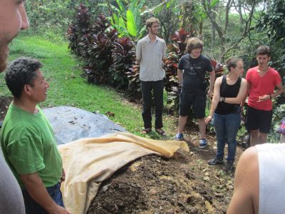 Students learn about the natural fertilizer the farm makes to offer rich nutrients for the coffee plants and more.